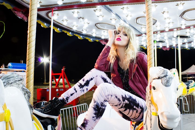 Girl on carousel horse