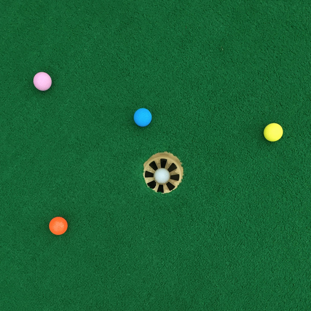 Golf balls and hole