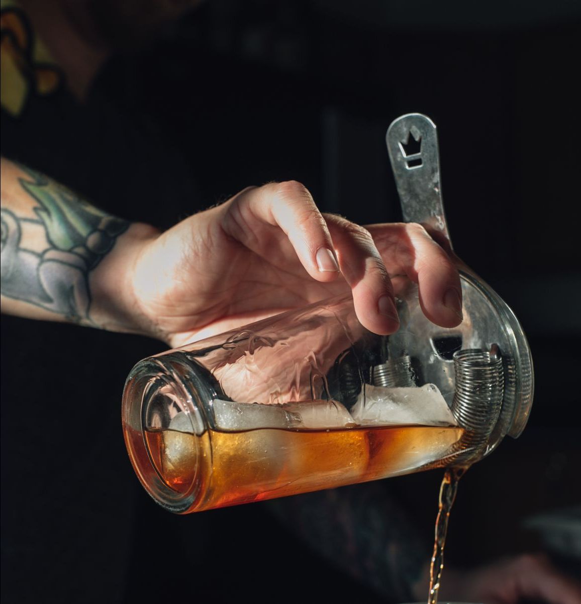 Bartender pouring a drink