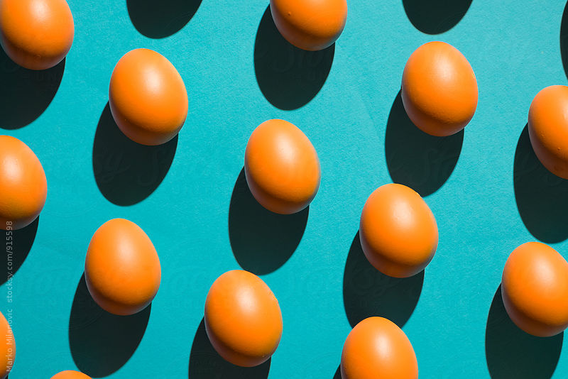 Eggs on blue paper
